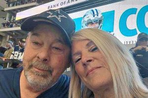 A man and a woman at a football game