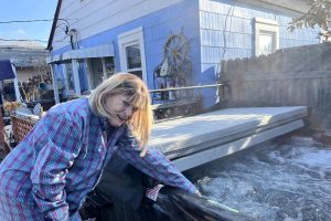 Woman standing by a hot tub